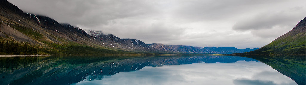 Beautiful reflectiive waters at Lake Clark National Park and Preserve in Alaska