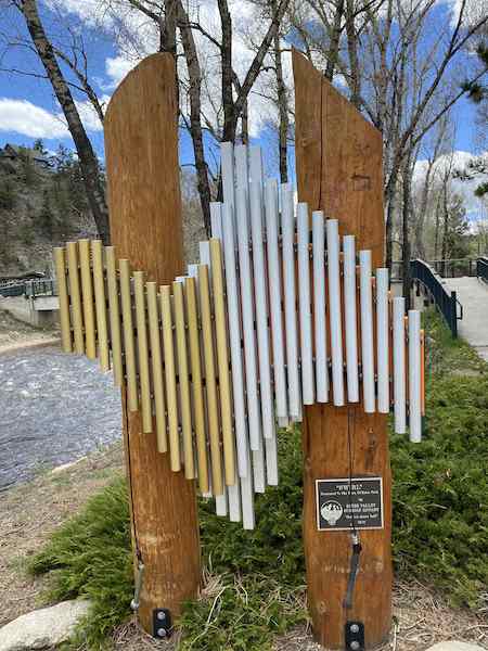 Play the xylophone on the river in downtown Estes Park, Colorado