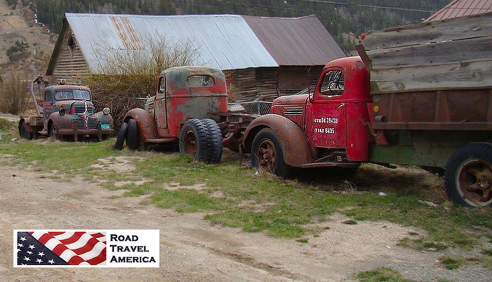 Old, red trucks at rest in Silverton