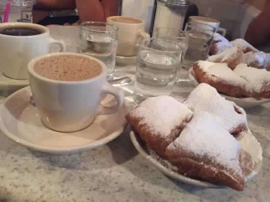 Cafe au Lait and beignets at Cafe du Monde in New Orleans