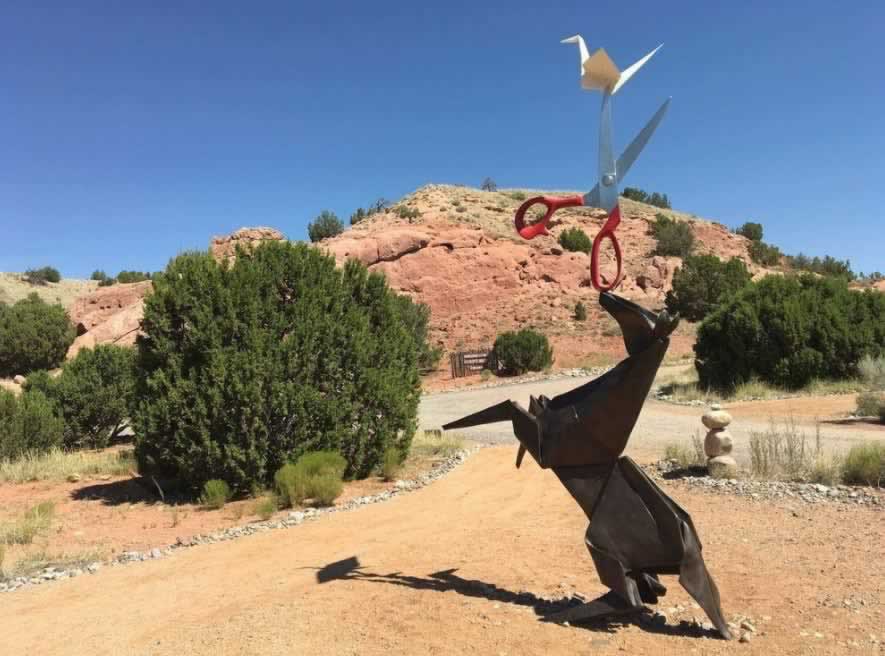 Art work and sculpture on a beautiful blue-sky day along the Turquoise Trail